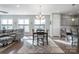 Open concept dining area with seating for four and kitchen views at 4779 Looking Glass Trl, Denver, NC 28037