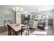 Bright dining area features a table with seating for four at 4779 Looking Glass Trl, Denver, NC 28037