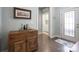 Bright entryway with wood floors and access to laundry at 4779 Looking Glass Trl, Denver, NC 28037