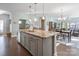 Spacious kitchen boasts granite countertops and modern cabinetry at 4779 Looking Glass Trl, Denver, NC 28037