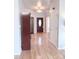 Hardwood entryway with a coat closet and interior doors at 5846 Hanna Ct, Charlotte, NC 28212