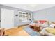 Living room with hardwood floors and large window at 7006 Penndale Dr, Shelby, NC 28152