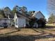 Back exterior of the house showcasing the deck area at 105 Beaver St, China Grove, NC 28023