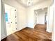 Hardwood floor hallway with access to bathroom and bedroom at 166 Fulworth Nw Dr # 67, Concord, NC 28027