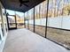 Screened porch with concrete flooring and ceiling fan at 166 Fulworth Nw Dr # 67, Concord, NC 28027