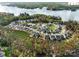 Beautiful aerial view of a lakeside neighborhood with lush greenery and waterfront properties at 18024 Wilbanks Dr, Charlotte, NC 28278