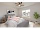 Cozy bedroom featuring a large window, comfortable bed, and stylish decor, creating a relaxing space at 18024 Wilbanks Dr, Charlotte, NC 28278