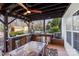 Outdoor kitchen with built-in grill and dining area at 1811 Robbins Meadows Dr, Waxhaw, NC 28173