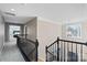 Upstairs hallway with access to bedrooms and stairs at 1811 Robbins Meadows Dr, Waxhaw, NC 28173