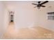 Bright bedroom featuring parquet floors, ceiling fan, and neutral walls at 588 Blossom Hill Rd, Lincolnton, NC 28092