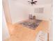 Sun-filled living room featuring parquet floors, ceiling fan, and neutral walls at 588 Blossom Hill Rd, Lincolnton, NC 28092