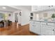 Bright dining area with hardwood floors and view into kitchen at 610 Crescent Cir, Kings Mountain, NC 28086