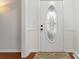 White front door with an oval glass design, adding charm to the entryway at 610 Crescent Cir, Kings Mountain, NC 28086