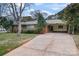 Brick ranch house with a carport and a well-maintained lawn at 610 Crescent Cir, Kings Mountain, NC 28086