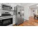 Stainless steel appliances and hardwood floors in kitchen at 610 Crescent Cir, Kings Mountain, NC 28086