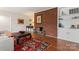 Living room with hardwood floors, fireplace, built-in shelving at 610 Crescent Cir, Kings Mountain, NC 28086