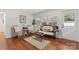 Living room with hardwood floors and vintage-style sofa at 610 Crescent Cir, Kings Mountain, NC 28086