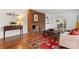 Living room with hardwood floors, a fireplace and large windows at 610 Crescent Cir, Kings Mountain, NC 28086