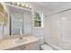 This bathroom features a vanity with an oval sink and a shower with a tub at 6707 Brachnell View Dr, Charlotte, NC 28269