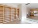 Built-in wooden bookshelves line the wall at 7031 Walton Heath Ln, Charlotte, NC 28277