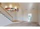 Bright entryway with staircase and wood flooring at 7031 Walton Heath Ln, Charlotte, NC 28277