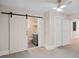 Bedroom with closet, half bathroom, and barn door at 1000 Bond Ave, Gastonia, NC 28052