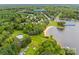 Aerial view of waterfront property with private beach, boats, and community at 1345 Shimmer Light Cir, Rock Hill, SC 29732