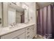 Bathroom showcasing a double sink vanity with marble countertop and a shower/tub combo at 1345 Shimmer Light Cir, Rock Hill, SC 29732