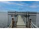 Private dock with composite walkway leading to a deep water covered boat slip, perfect for lake enthusiasts at 1345 Shimmer Light Cir, Rock Hill, SC 29732