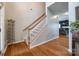 Hardwood floors and staircase in entryway, leading to upper level at 1345 Shimmer Light Cir, Rock Hill, SC 29732