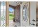 Elegant front door with glass inserts and a view of the front yard at 1490 Kensington Park Ct, Hickory, NC 28602