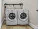 Convenient laundry room with side-by-side washer and dryer at 1490 Kensington Park Ct, Hickory, NC 28602