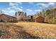 Large backyard with mature trees at 1601 Bennington Nw Dr, Concord, NC 28027