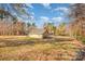 Large backyard with detached garage, and mature trees at 1601 Bennington Nw Dr, Concord, NC 28027