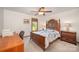 Bedroom with wood furniture and desk workspace at 1601 Bennington Nw Dr, Concord, NC 28027