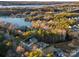 Aerial view showing home's location near a lake and community at 17718 Snug Harbor Rd, Charlotte, NC 28278