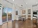 Kitchen breakfast nook with built-in bench seating and access to deck at 17718 Snug Harbor Rd, Charlotte, NC 28278