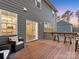 Spacious deck with seating area and view of backyard at 17718 Snug Harbor Rd, Charlotte, NC 28278