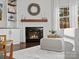 Modern corner fireplace with shiplap wall and mantel at 17718 Snug Harbor Rd, Charlotte, NC 28278