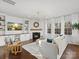 Spacious living room with corner fireplace and large windows at 17718 Snug Harbor Rd, Charlotte, NC 28278