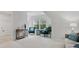 Spacious loft area with seating and a view of the laundry room at 17718 Snug Harbor Rd, Charlotte, NC 28278