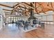 Large community room with high ceilings, a stone fireplace, and ample seating at 236 Ascot Run Way, Fort Mill, SC 29715