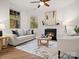 Living room featuring fireplace and ample natural light at 236 Ascot Run Way, Fort Mill, SC 29715