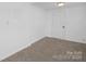 Small bedroom with neutral walls and carpeted floor at 304 Gold Hill Ave, Rockwell, NC 28138