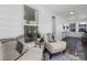 Sunroom with cozy seating area and natural light at 304 Gold Hill Ave, Rockwell, NC 28138