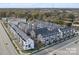 Aerial view of newly constructed townhome community with modern architectural details and landscaping at 3614 S Tryon St # 18, Charlotte, NC 28217