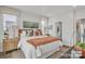 Bright bedroom with large window, comfortable bed, stylish decor, and natural light at 3614 S Tryon St # 18, Charlotte, NC 28217