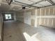 Large unfinished garage with concrete floor, abundant space, and natural light at 3614 S Tryon St # 18, Charlotte, NC 28217