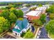 An aerial view showcasing a quaint building and surrounding town at 5734 Morris Hunt Dr, Fort Mill, SC 29708