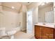 Well-appointed bathroom with shower, toilet and vanity at 5734 Morris Hunt Dr, Fort Mill, SC 29708